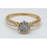 A 18ct gold ring set with diamonds in a cluster, total 0.26ct, 2.