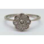 An 18ct white gold ring set with diamonds in a cluster (size R)