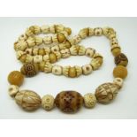 A carved African beaded necklace