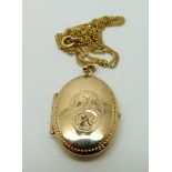 A 9ct gold locket and chain, 4.