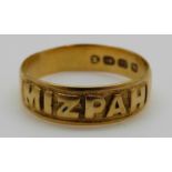 An 18ct gold ring reading 'Mizpah', 2.