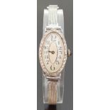 Art Deco Cartier style platinum ladies cocktail wristwatch with Arabic numerals,