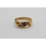 A late Victorian/ early Edwardian 18ct gold ring set with three sapphires and two diamonds, 2.