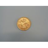 A 1903 gold sovereign,