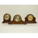 Three c1920's mantel clocks in mahogany cases with banded / string inlay decoration,