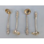 A set of four Victorian hallmarked silver apostle salt spoons of ladle form,
