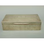 A George V hallmarked silver cigarette box with engine turned lid, Birmingham 1929 maker D Bros,