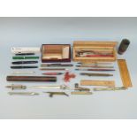 A collection of vintage pens including Parker, artist's dip pens, ephemera,