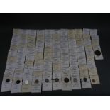 A collection of world coinage, catalogued in envelopes, includes USA, Holland,