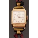 Sanco 18ct gold ladies wristwatch with gold hands and Arabic numerals and silvered face on burgundy