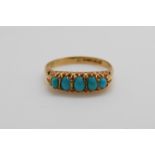 An 18ct gold ring set with five turquoise cabochons in a Cheltenham box,