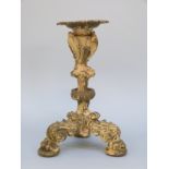 A 19thC ornate bronze / brass candlestick,