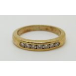 An 18ct gold ring set with diamonds, 3.