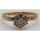 A 9ct gold ring set with diamonds in a cluster (size L)