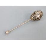 A Victorian hallmarked silver tea strainer or infuser with ball finial to the handle,