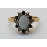 A 18ct gold ring set with an opal surrounded by diamonds and sapphires (size J)