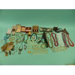 A collection of costume jewellery including chains,