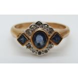 A 9ct gold ring set with an oval sapphire,