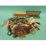 A collection of costume jewellery to include Venetian beaded necklaces, Art Deco,