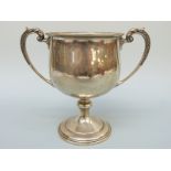 A George V hallmarked silver twin-handled trophy cup,