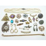 A collection of Victorian jewellery including brooches, an enamel bird brooch, a paste brooch,