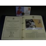 A Queens Golden Jubilee 2002 folder containing 14 crown and stamp covers, includes £5 examples.