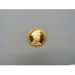 A 9ct gold Earl Mountbatten coin HMS Kelly reverse, with certificate, 5.