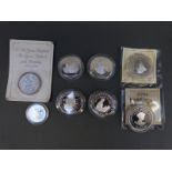 Seven silver proof commemorative coins,