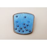 A Norwegian silver brooch set with blue enamel, 3.5 x 3.