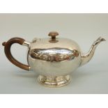 A George V Mappin & Webb bullet shaped hallmarked silver teapot, London 1926, length 23.