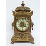 Samuel Marti 19thC brass gilt two train mantel clock, striking on a gong,