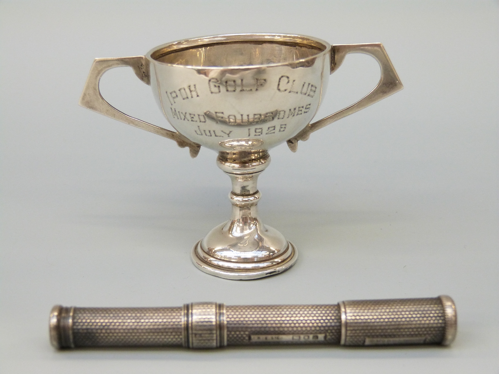 S. Mordan & Co Patent hallmarked silver double ended pen/pencil and a small silver trophy.