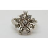 An 18ct white gold ring set with diamonds, 4.