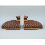 A pair of Regency mahogany pier / wall brackets of moulded shell form with gilded decoration,