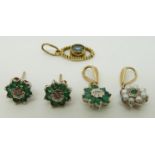 A 9ct gold pendant set with emeralds and a diamond with matching earrings together with two other