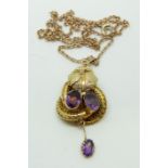 A Victorian pendant set with two oval amethysts with textured foliate design and another drop