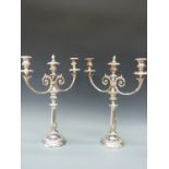 A large pair of silver three branch plated candelabra,