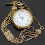 Silver gilt ladies pocket watch with Roman numerals and floral decoration to the white enamel dial,