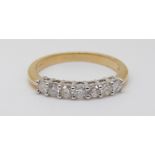 An 18ct gold half eternity ring set with diamonds totalling approximately 0.5ct, 3.