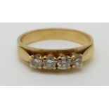 A 9ct gold ring set with four diamonds, 3.