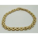 A 9ct gold bracelet made up of rectangular links, 11.