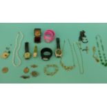 A collection of jewellery to include a 9ct gold brooch, necklaces, watches,