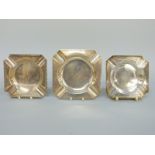 Three various hallmarked silver ashtrays, width of largest 10.