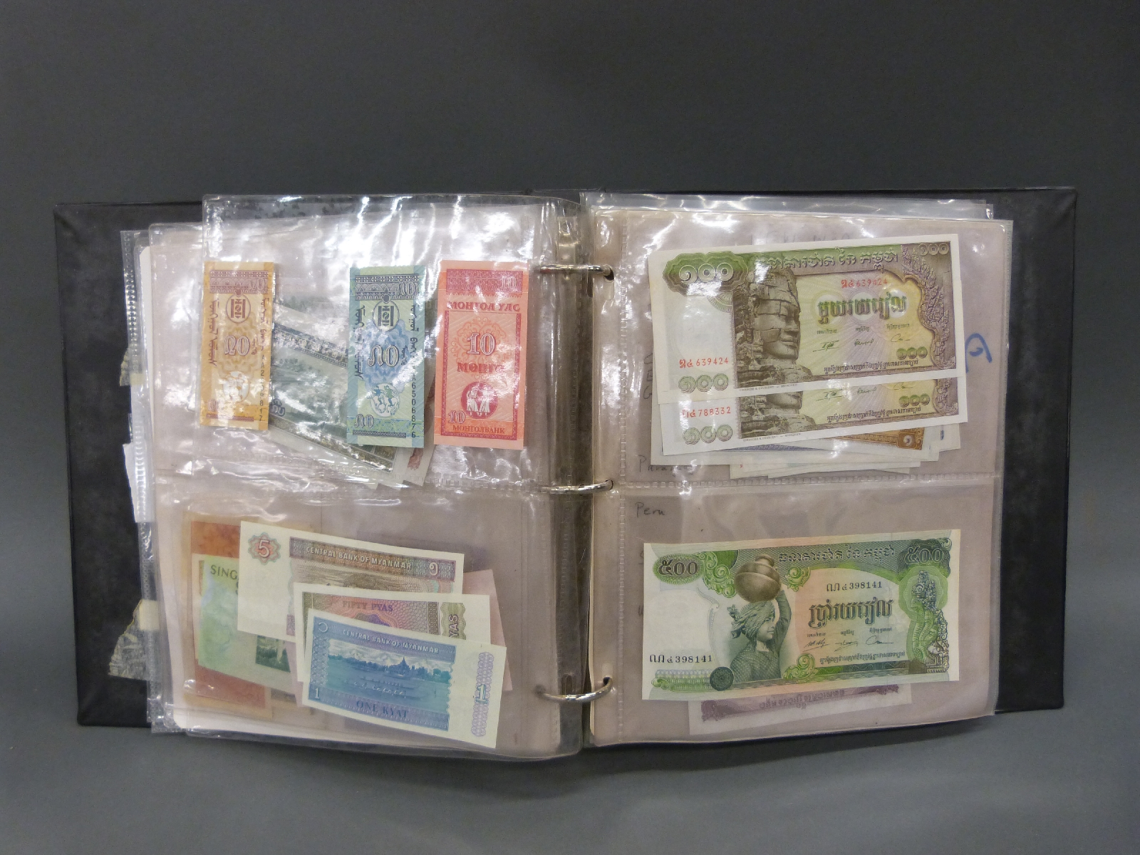 A collection of world bank notes in an album, approximately 180 in all, many uncirculated, - Image 4 of 6
