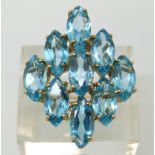 A 9ct gold ring set with blue topaz (size S)