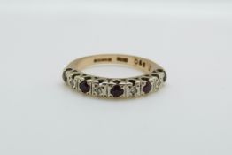 A 9ct gold half eternity ring set with diamonds and rubies, 3.