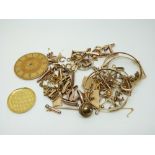 A 9ct gold cufflink, 9ct gold watch back, Victorian stick pin, 9ct gold clasps,