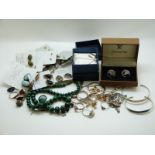 Three silver bracelets, silver necklaces, silver earrings, malachite, a quantity of silver rings,