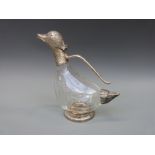 A novelty claret jug formed as a duck,