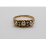 An 18ct gold ring set with three pearls and four old cut diamonds, 3.